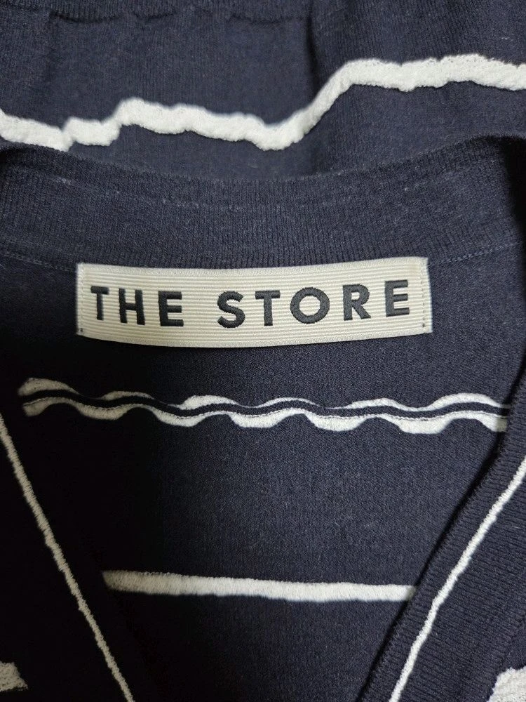 한섬 더스토어 THE STORE 22 보석 단추 슬리브리스 니트 베스트 (F) 이미지