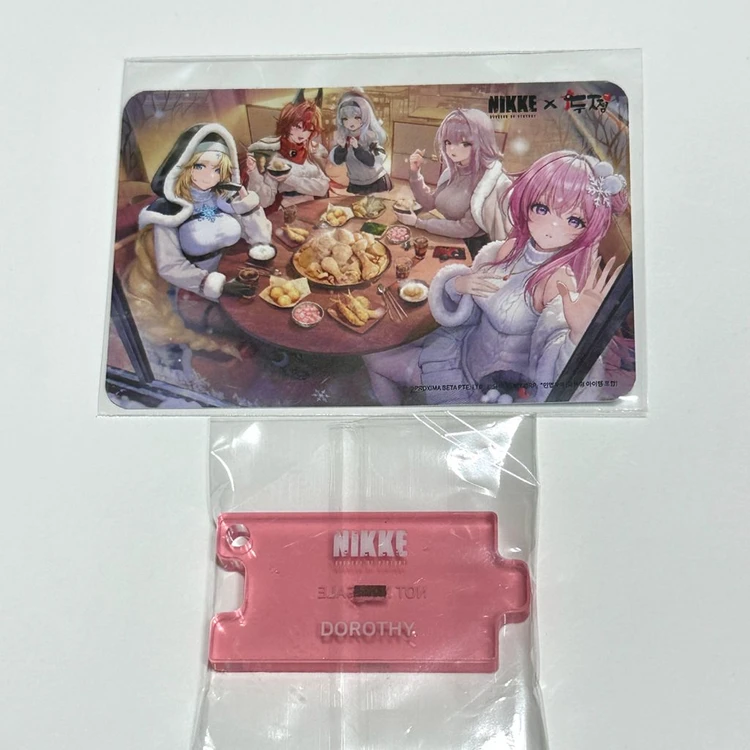 니케 두찜 콜라보 도로시 받침 키링 아크릴 굿즈 도로롱 포토카드 이미지