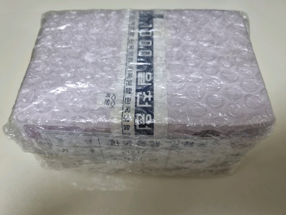 미사용 구권 천원 1,000장 관봉 다발 이미지