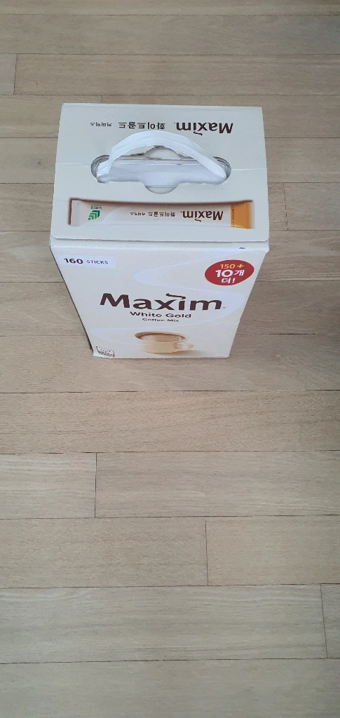 5만원/ 맥심화이트커피 160개 +청정원 카놀라유 500ml 3개 + 백설 카놀라유500ml 2개 +청정원 요리올 이미지
