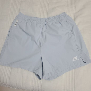 New Balance 뉴발란스 M 하늘색 여름 반바지 쇼츠 트레이닝복 운동 러닝 테니스 이미지