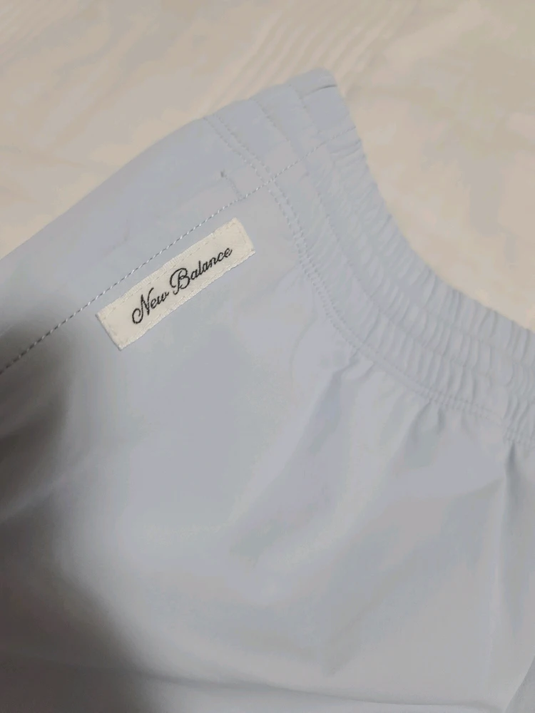 New Balance 뉴발란스 M 하늘색 여름 반바지 쇼츠 트레이닝복 운동 러닝 테니스 이미지