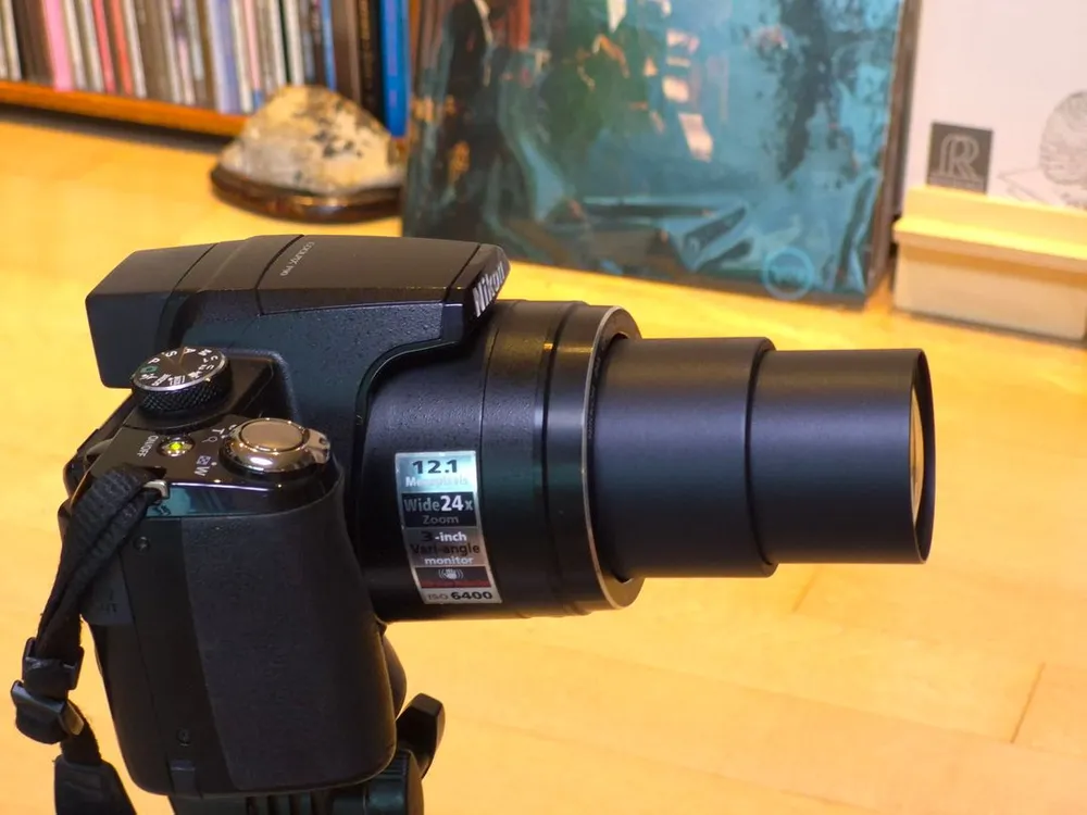 니콘망원렌즈 카메라/ COOLPIX P90 디지탈 / 새 배터리 2개 / 새 충전기 / 캐논 정품케이스 이미지