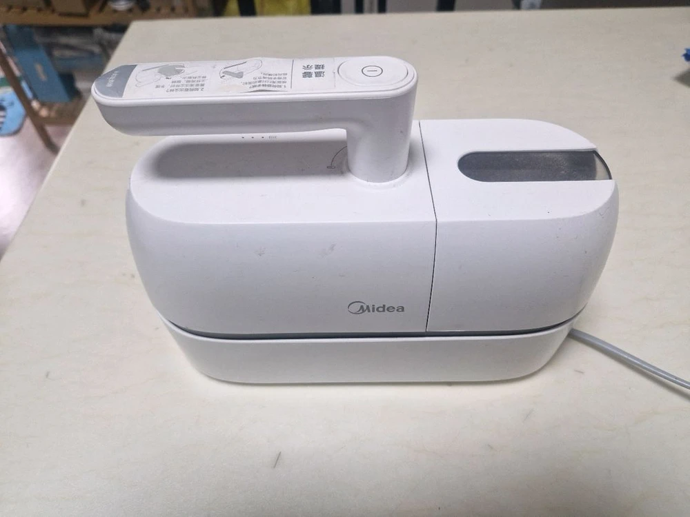 midea 침구 청소기(내림) 이미지
