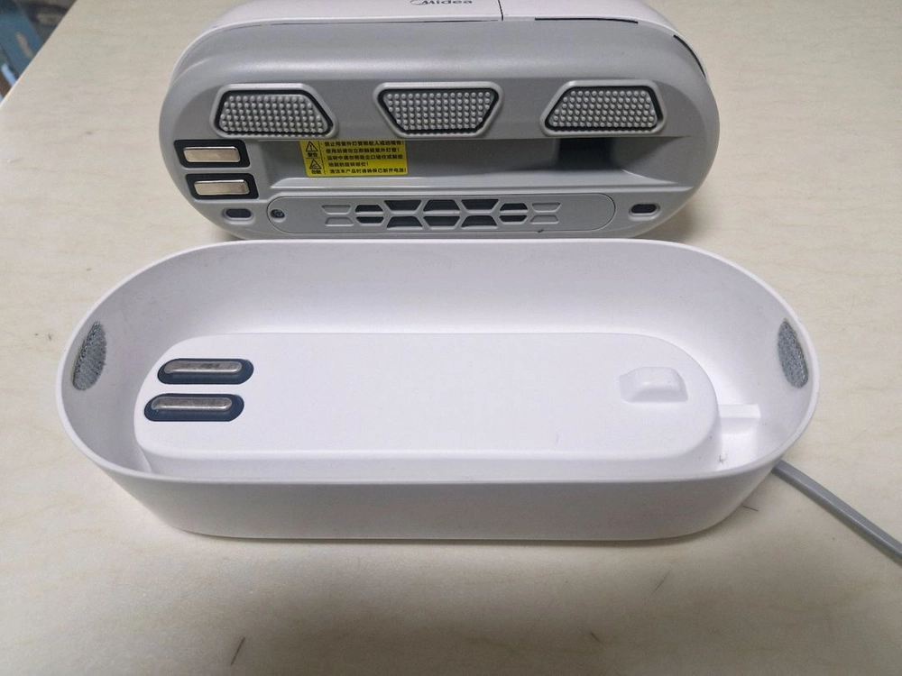 midea 침구 청소기(내림) 이미지