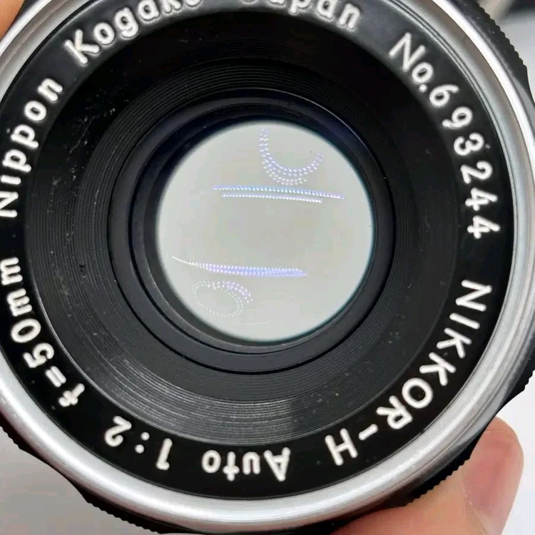 니콘 필름카메라 fe2 블랙 50mm f2 렌즈 이미지