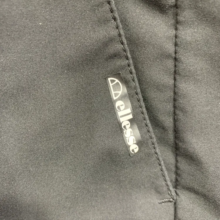 엘레쎄 ellesse 공용 블랙 스포티 그래픽 우븐 4부 팬츠 EK2MAPH519 (85) 이미지