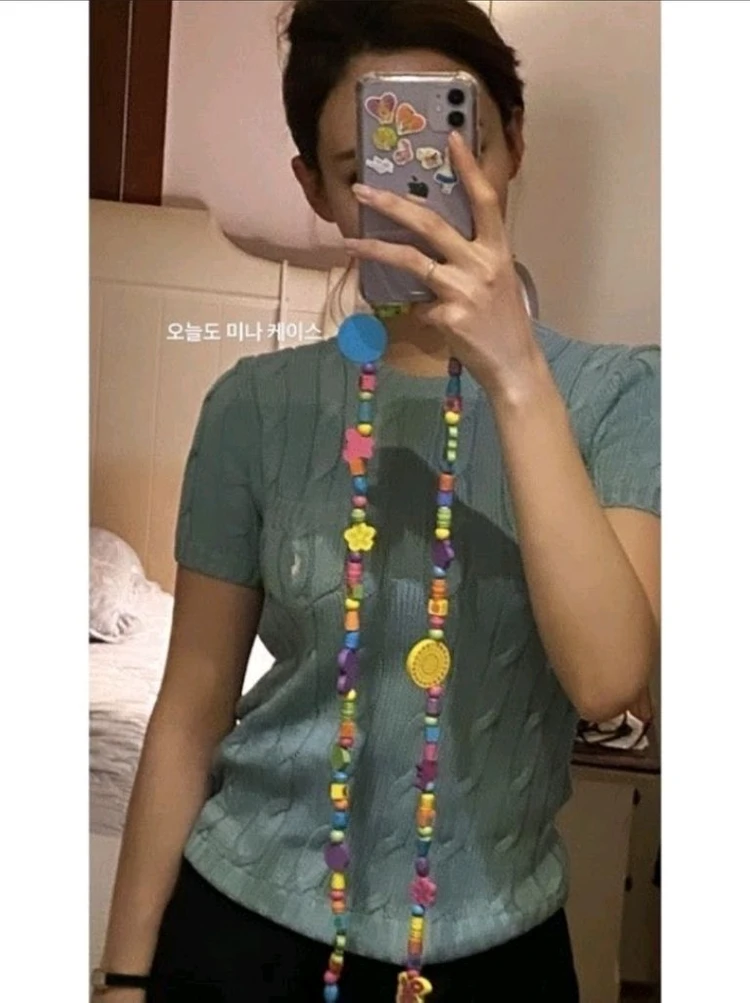 (희귀템)트와이스 나연 폴로 랄프로렌 포켓 반팔니트 꽈배기 케이블 스웨터 이미지