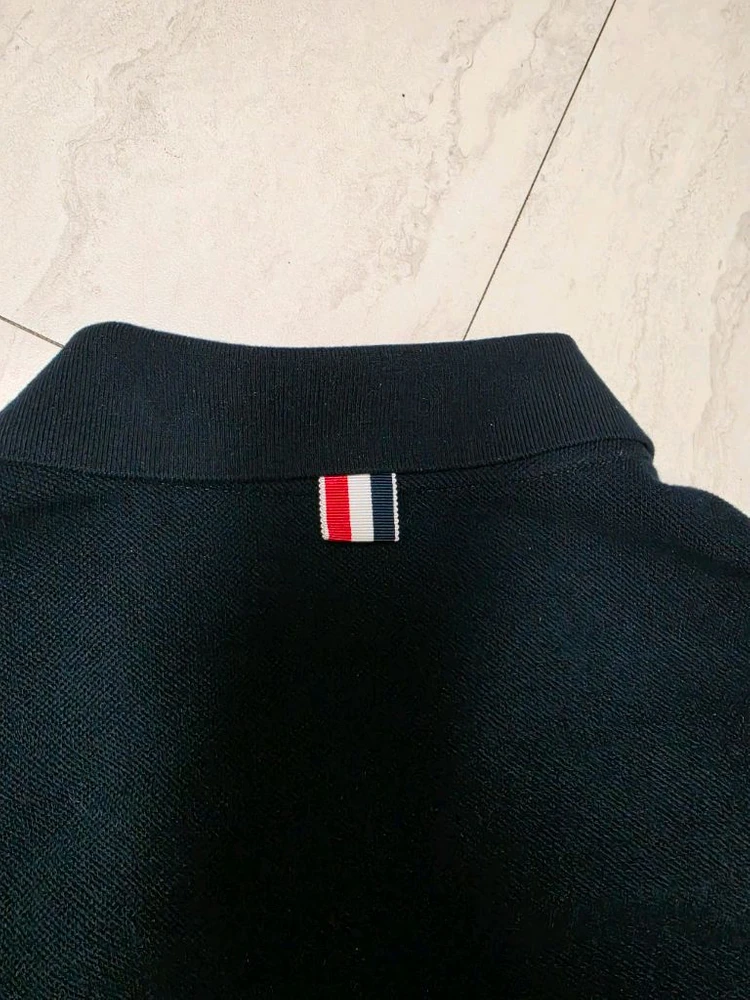 톰브라운 4바 스트라이프 폴로셔츠 이미지