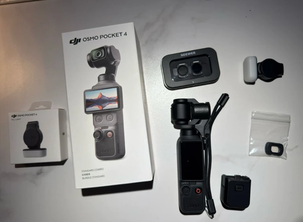 DJI 오즈모 포켓4 스탠다드 콤보(2년 DJI케어포함)+필라이트+정품광각렌즈+mic mini+가변nd필터 팝니다 이미지