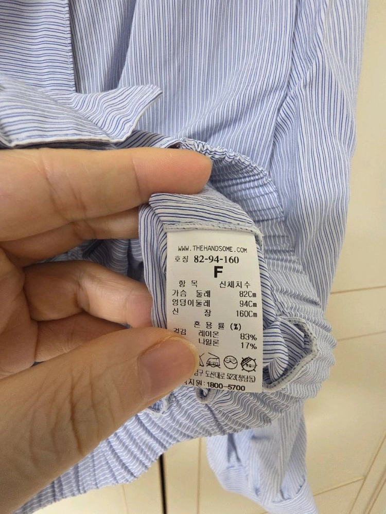한섬타임 버튼블라우스 이미지