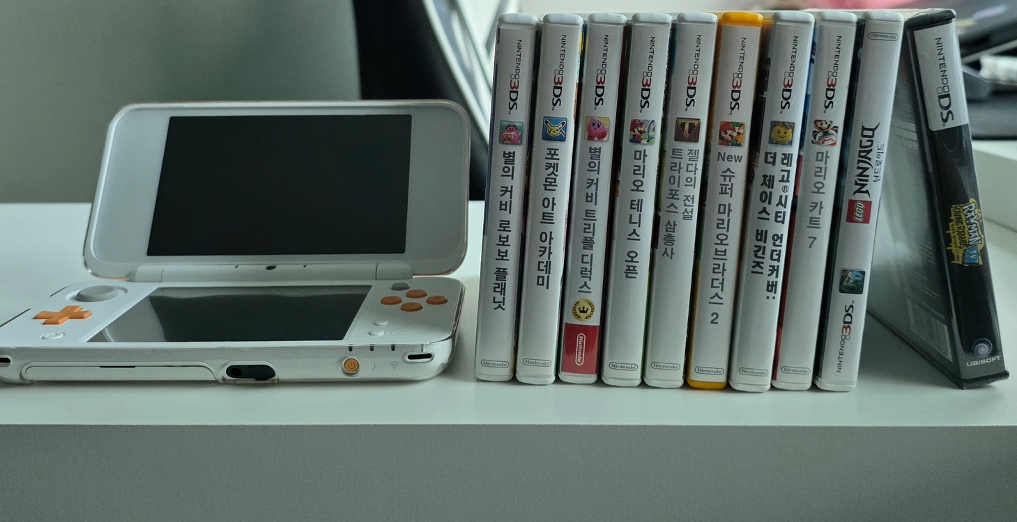 가격포기 던질게요A급닌텐도ds 뉴 New 2ds xl 화이트오렌지+ 게임칩 미개봉 포함 10개 - 안심되는 중고거래
