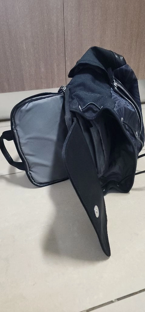 투미 여성 플랩 백팩 이미지