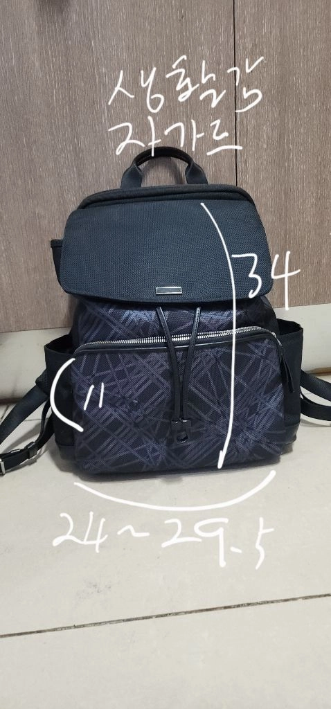 투미 여성 플랩 백팩 이미지