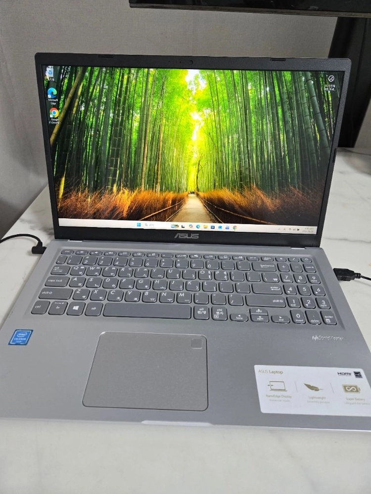 ASUS 실버 노트북 15인치 풀 HD 해상도입니다. 윈도우 11이 설치되어 있어 바로 사용 가능합니다. 15인치 - 안심되는 중고거래