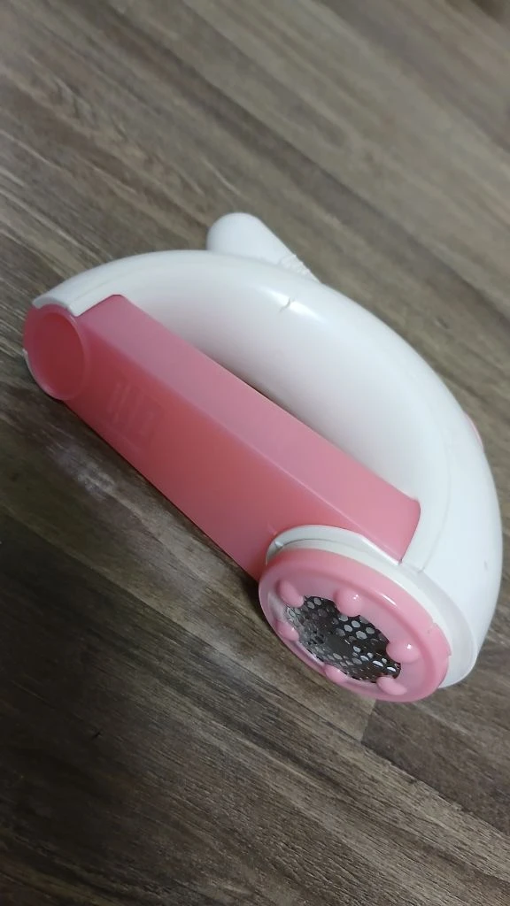핑크 보풀 털뭉치 제거기 건전지사용 이미지