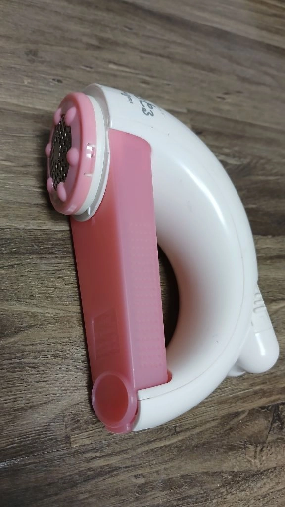 핑크 보풀 털뭉치 제거기 건전지사용 이미지