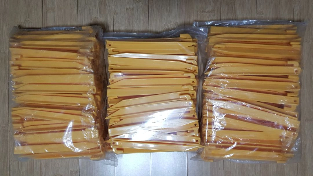 (새상품)플라스틱 단조 23cm 노란색 텐트못 싸게 팝니다. 이미지
