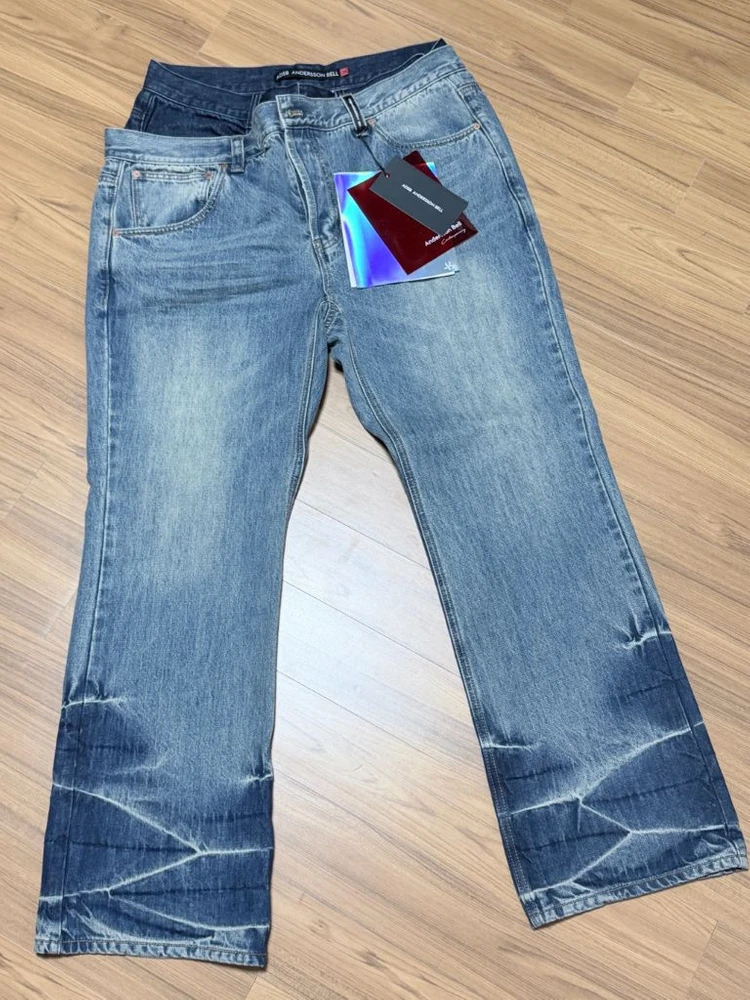 (32)앤더슨벨 UNISEX ASYMMETRIC LAYERED WIDE-LEG JEANS apa871u 이미지