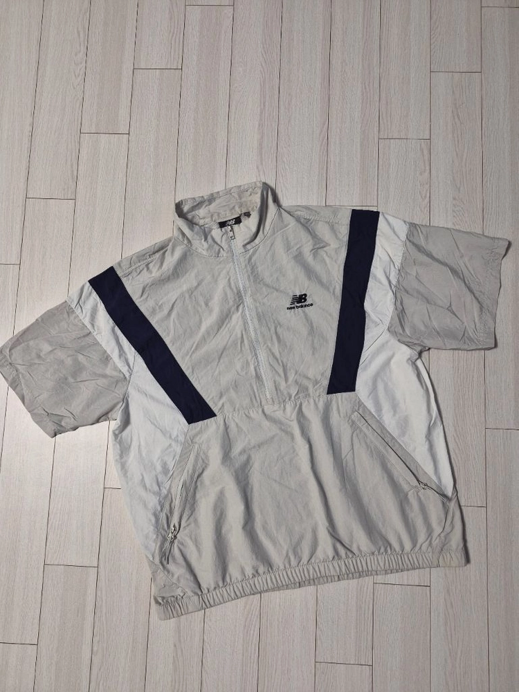 뉴발란스(NEW BALANCE) UNI N플라잉 반팔 아노락 바람막이 자켓 사이즈100L 이미지