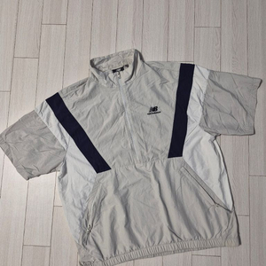 뉴발란스(NEW BALANCE) UNI N플라잉 반팔 아노락 바람막이 자켓 사이즈100L 이미지