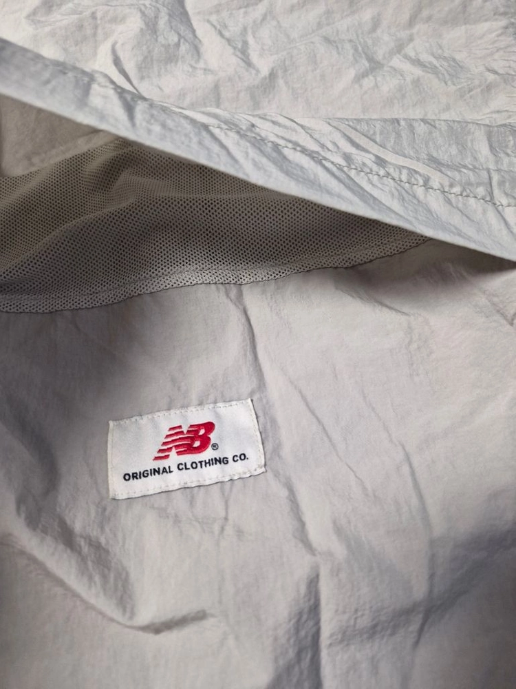 뉴발란스(NEW BALANCE) UNI N플라잉 반팔 아노락 바람막이 자켓 사이즈100L 이미지