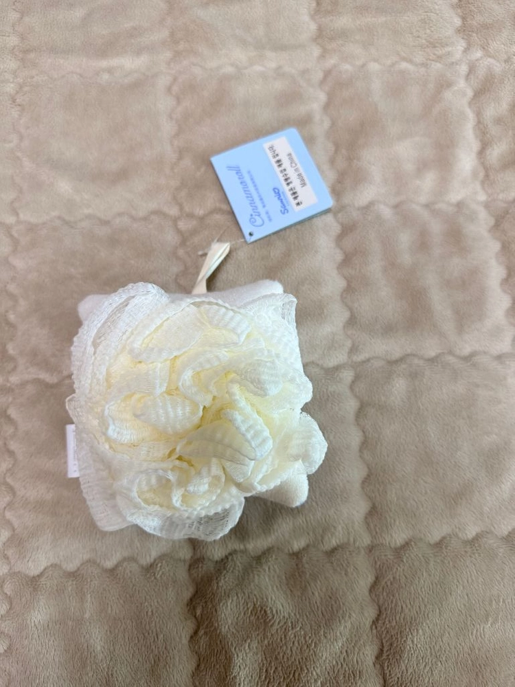 귀여운 시나모롤 캐릭터가 그려진 샤워 때밀이입니다. 이미지