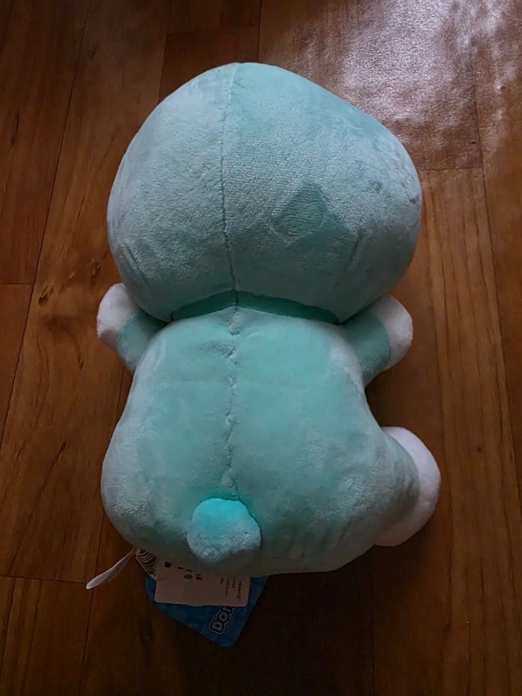 민트색 도라에몽 웃는 얼굴 봉제인형 이미지