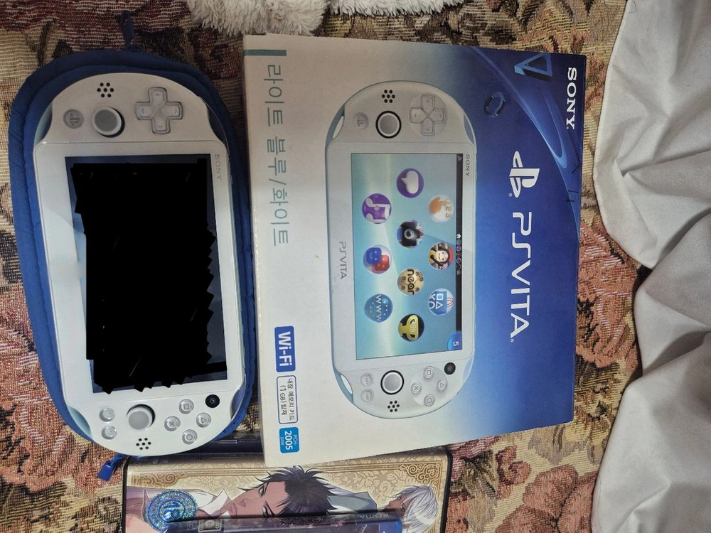 psvita 2세대 라이트블루/화이트 + 외장메모리 64GB 이미지