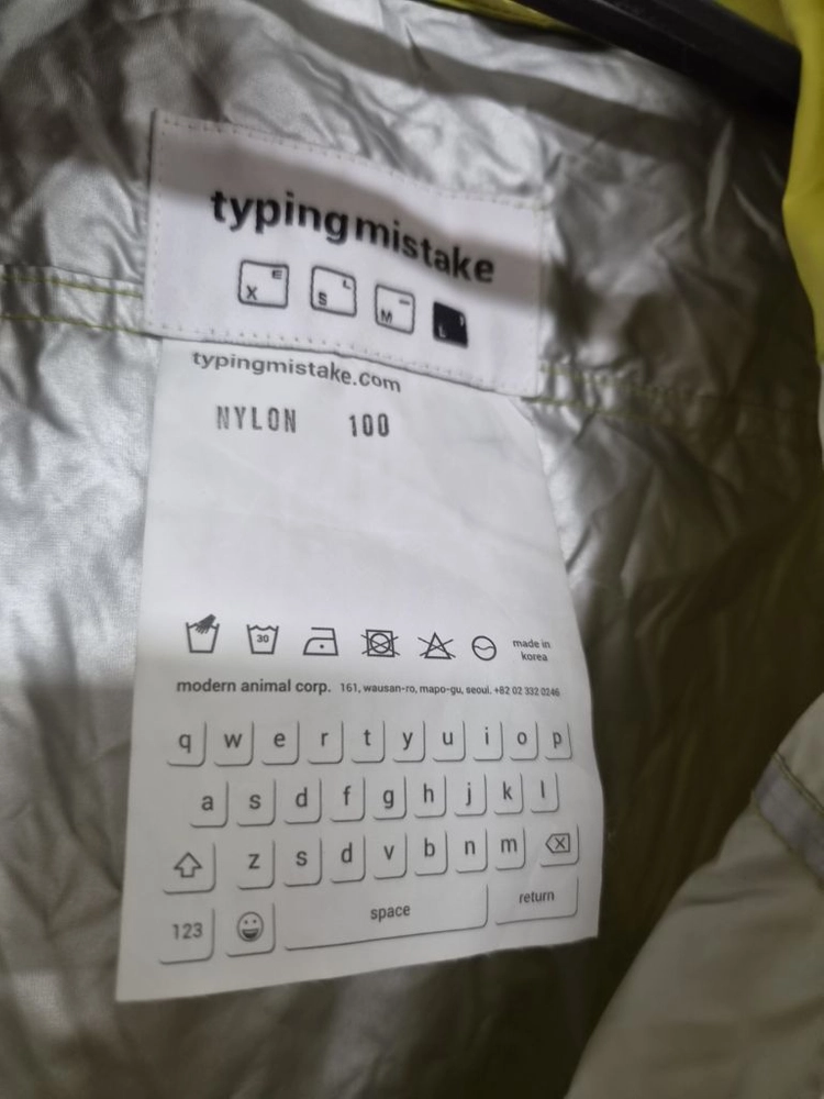 타이핑 미스테이크(typing mistake) 나일론 후드 바람막이 자켓 (라임 / L) 이미지