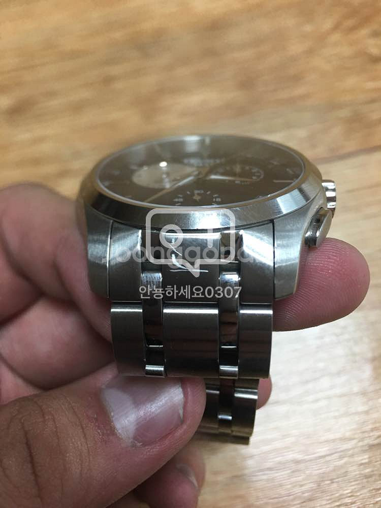 티쏘 꾸뜨리에 GMT --6