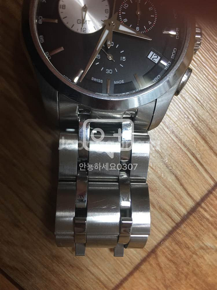 티쏘 꾸뜨리에 GMT --7