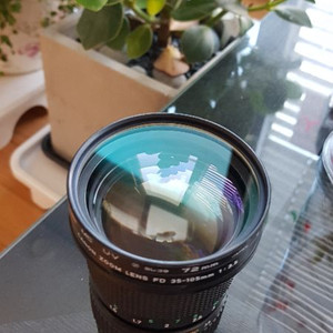 FD 35-105mm + adapter(FD-NE